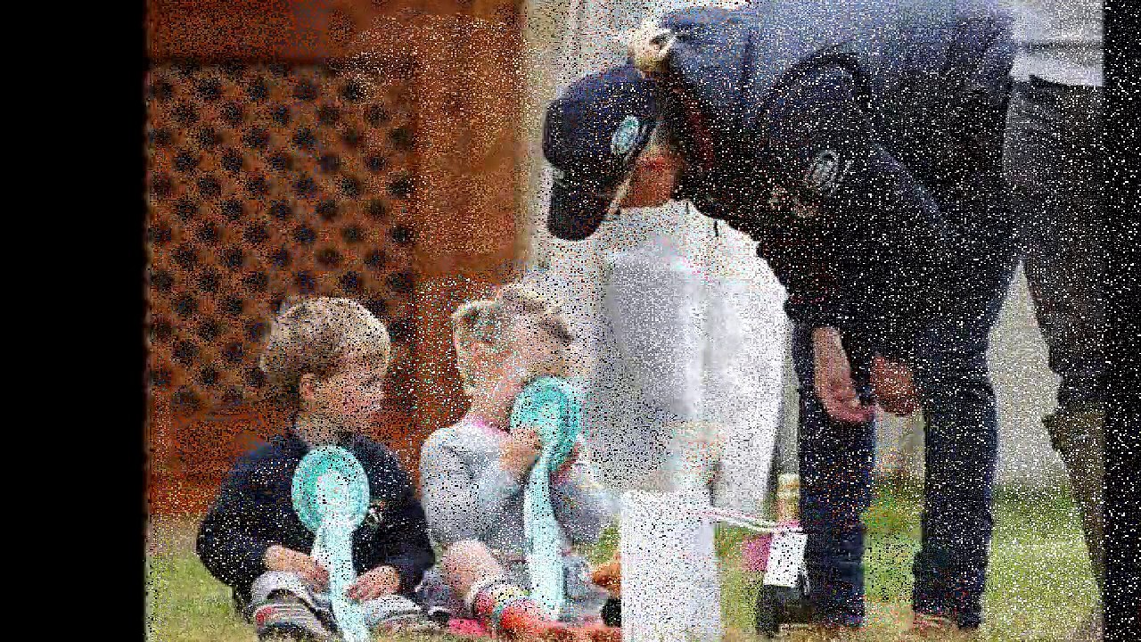 Mia Tindall playfully sticks her tongue out during a VERY animated chat with her adorable pal