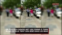 Un policier chinois plaque une femme et son bébé au sol, la vidéo choc !