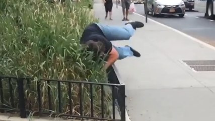 Skateboarder Goes Head-First into Bars
