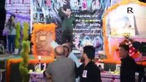 شاهد... شاعر عراقي يهاجم بشار الاسد واحد المسؤولين يحاول اسكاته !!