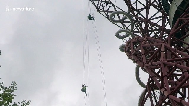 Radio presenter gets hair tangled in rope during charity abseil