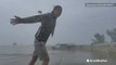 Intense hurricane winds hold up storm chaser's body as he tracks Irma