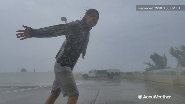 Intense hurricane winds hold up storm chaser's body as he tracks Irma