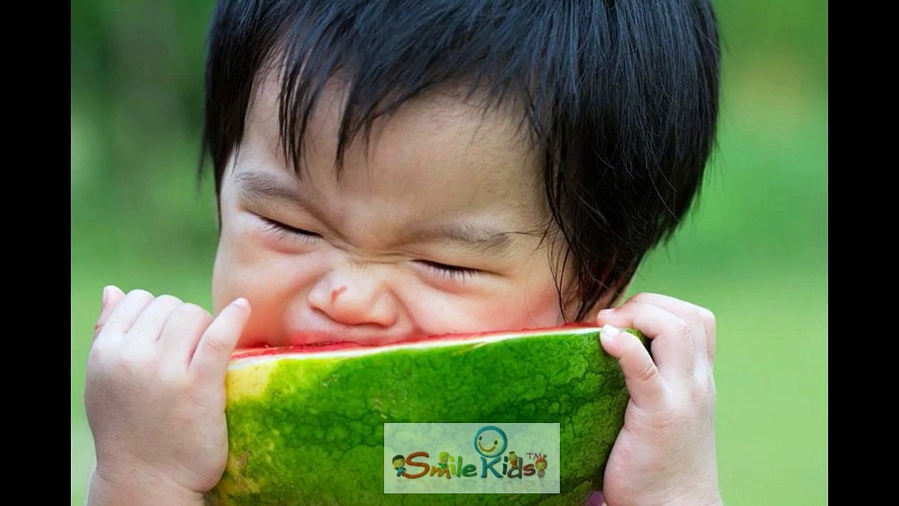 Adorable Baby enjoy to eat Watermelon