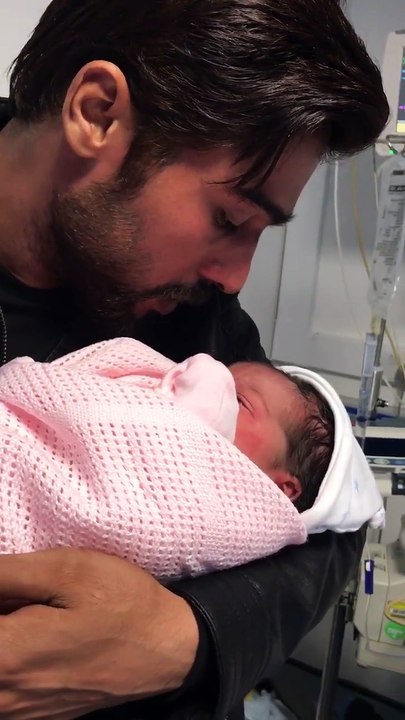 Muhammad Amir giving Azan in his daughter's ears
