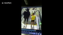 Chinese boy gets hand stuck in escalator