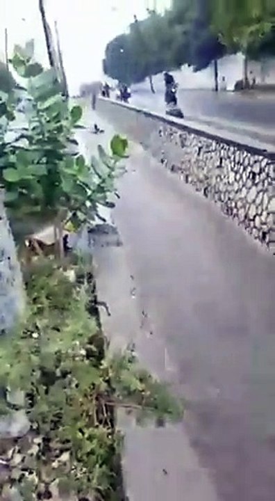 Video Heroic rescue, man pulls child from flood waters in Trench Town Loop News