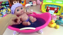 Baby Doll Bath with dolphin and Poli toys more Kinder Joy Surprise eggs