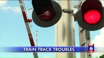 Video Shows Woman Escaping Car Trapped on Railroad Tracks Right Before Train Smashes it