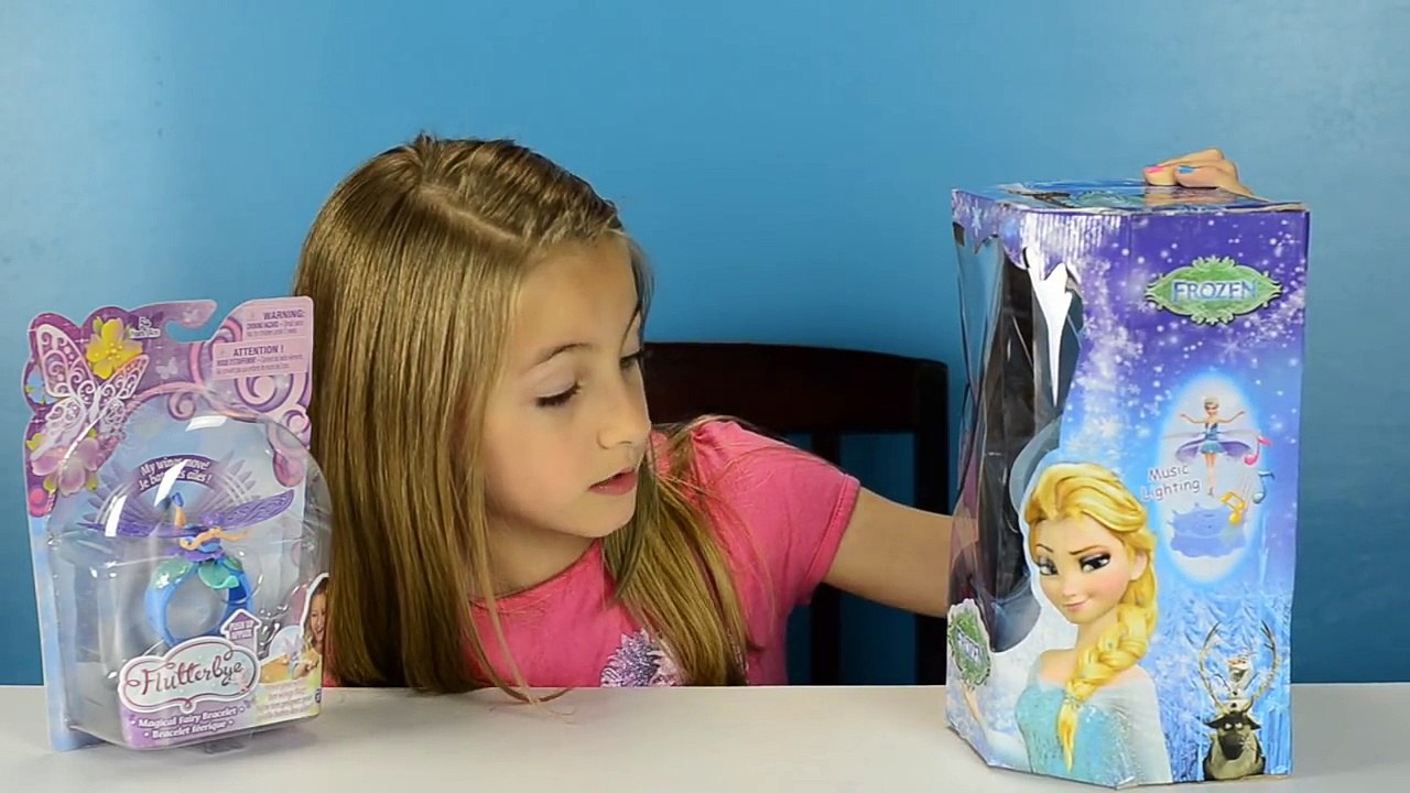 New Toys FLYING ELSA with Lights and Music FLUTTERBYE Magical Fairy Bracelet Light up Elsa Doll