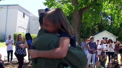 Navy pilot surprises daughter at Pensacola school