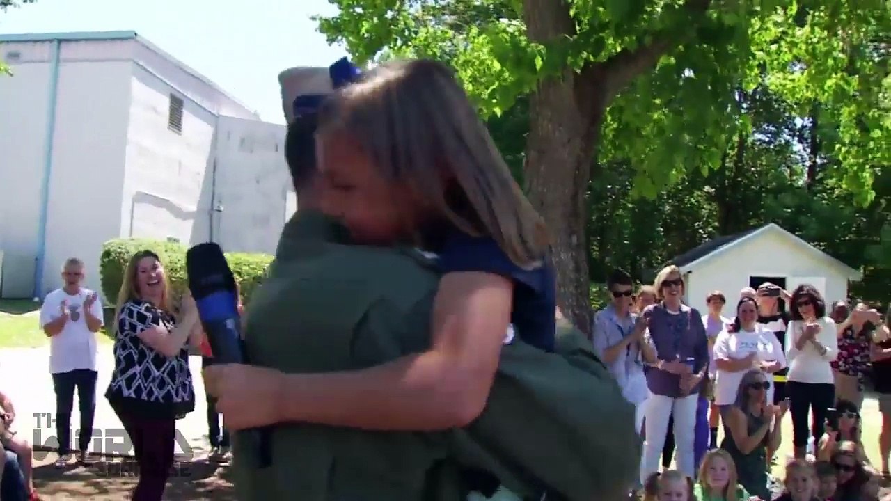 Navy pilot surprises daughter at Pensacola school