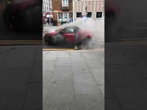 Bystanders Attempt to Stop Rolling, Flaming Car in Walthamstow, London