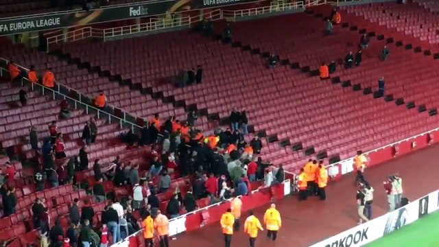 Koln fans fighting with stewards inside the stadium