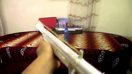 How to Make a Paper Shotgun That Shoots - rubber band paper gun