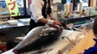 Tuna cutting in Japanese sushi restaurant