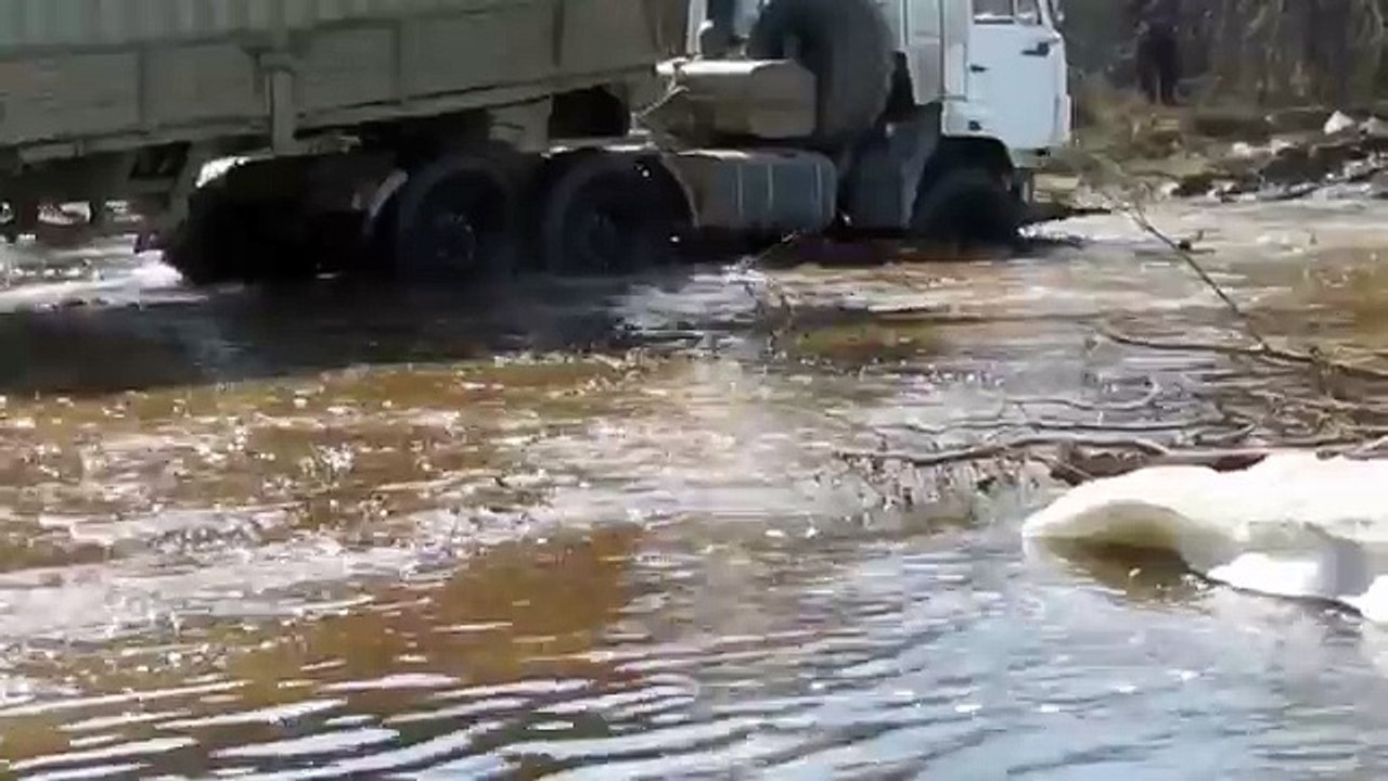 Off-road 6x6 Truck with Trailer Kamaz Crossing Siberian River