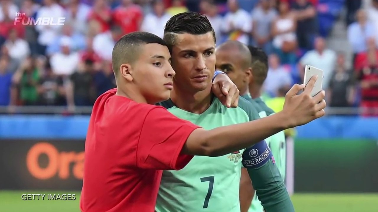 Cristiano Ronaldo Lets Ball Boy Crash Team Pic & Takes Selfie with Him