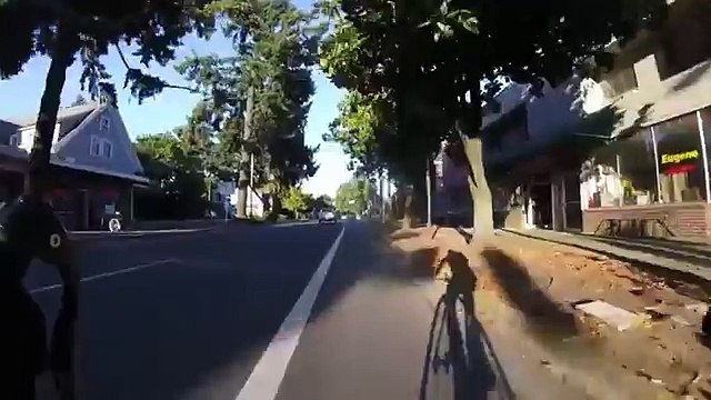 Angry driver gets laid out, after attacking cyclist that was waiting for pedestrians to cross