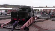 British Steam Train being turned around on a Railway Turntable