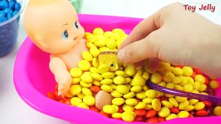 Learn Colors Baby Doll Bath Time with M&Ms Chocolate kids videos for toddlers