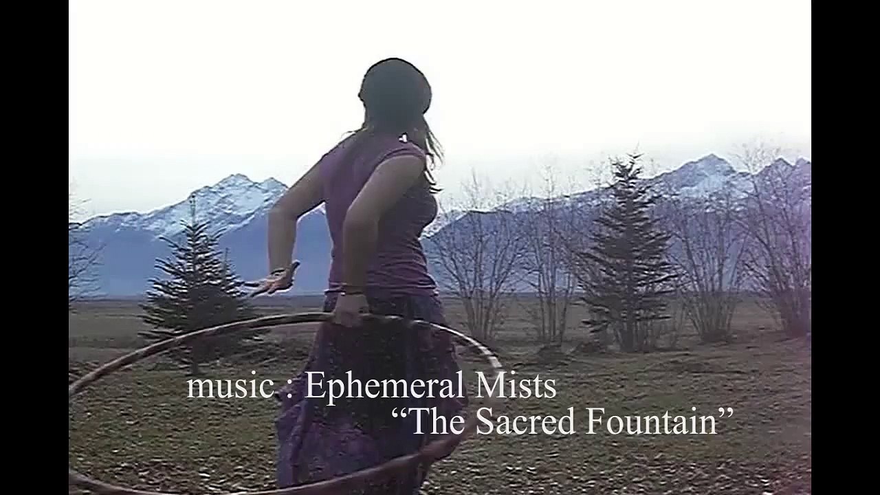 Beautiful hoop dancing in the mountains - modern hoop dance