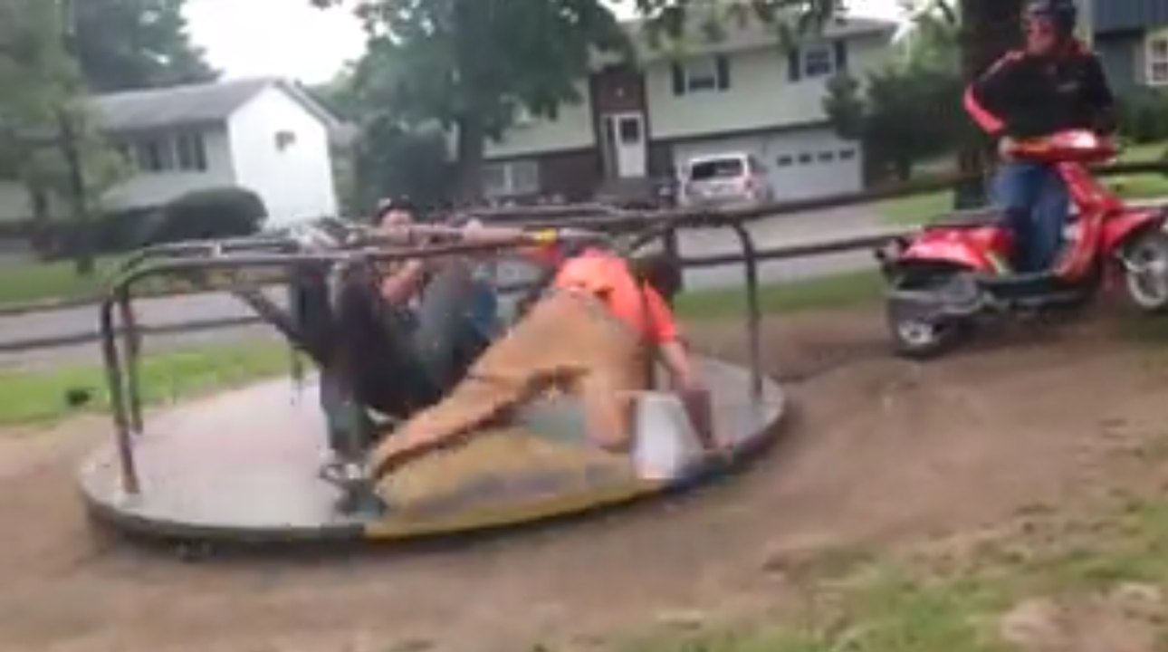 Epic Fail When Three Guys On A Merry Go Round Powered By A Scooter
