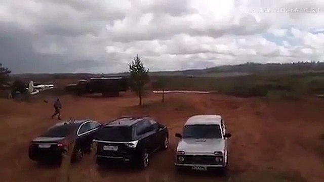 Terrifying moment Russian helicopter fires on bystanders