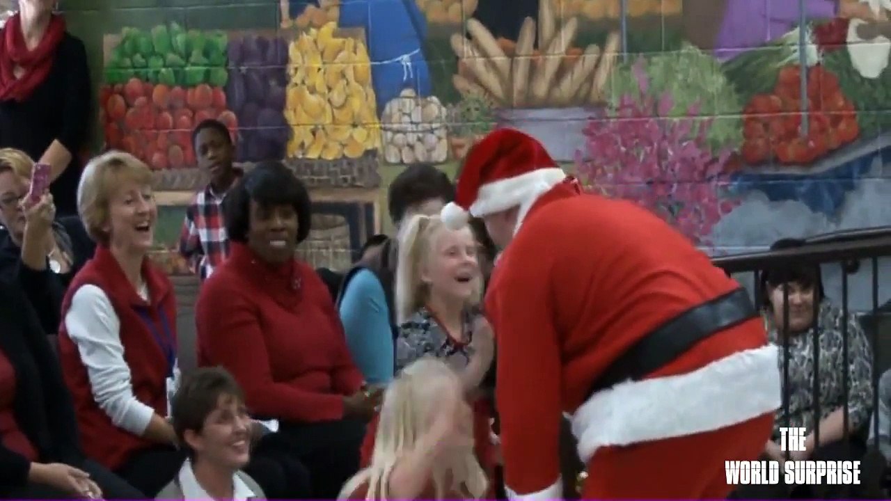 Soldier Dressed as Santa Surprises Daughters