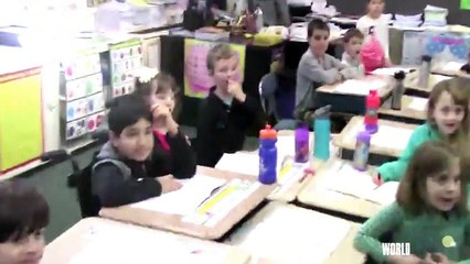 'Hero' Soldier Surprises Afghan Boy at School