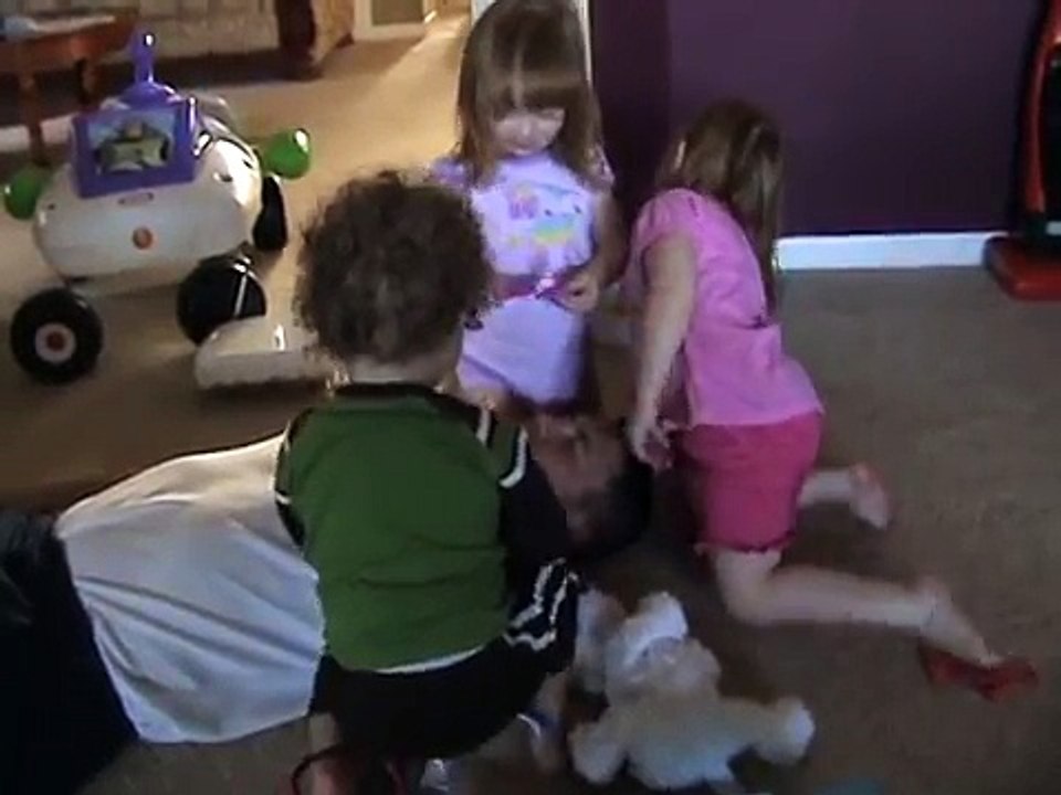 kids playing doctor with daddy