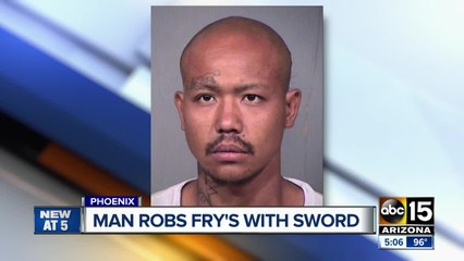Man robs grocery store with sword
