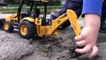 Toy Trucks for Kids: Bruder Construction Trucks: JCB Backhoe Digging in Mud