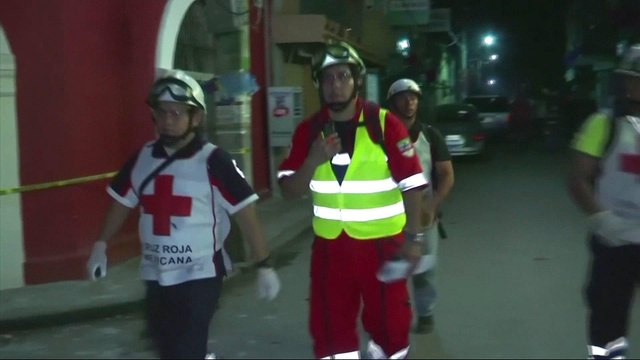 Mexico rescuers find earthquake survivors under school rubble