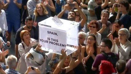 Spanish police raid Catalan government headquarters, arrest top official