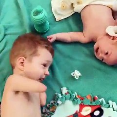 "Heart touching" , Baby with no hands helps other baby, Must watch.