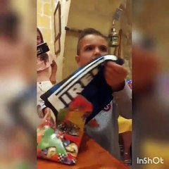 A little Juventus fan gets an Inter jersey for his birthday...he was not happy