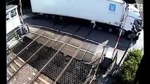 Reckless Lorry Driver Gets Stuck After Crashing Through Level Crossing Barriers