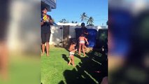 Terrier falls on little girl during water fight in Hawaii