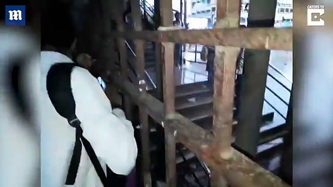 Mumbai train ploughs into a flooded station at 60mph