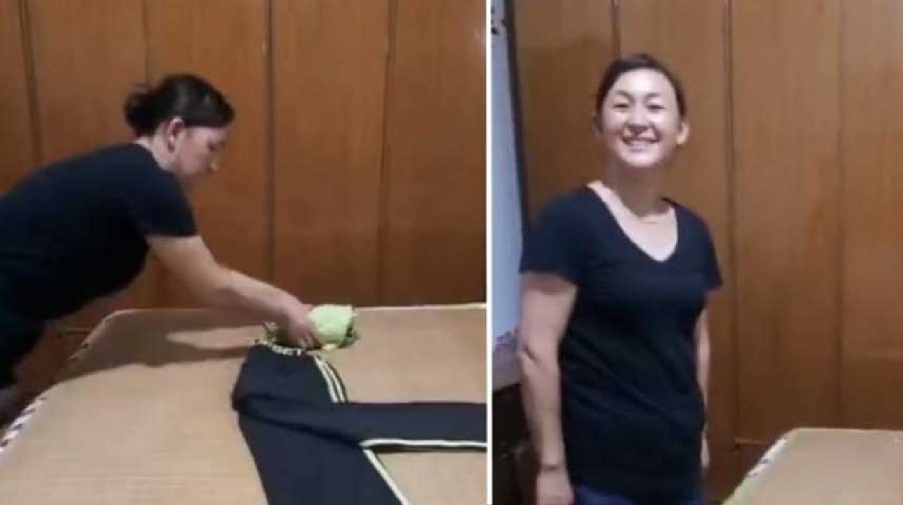 Cette dame a une technique géniale pour plier les vêtements... et en plus avec le sourire
