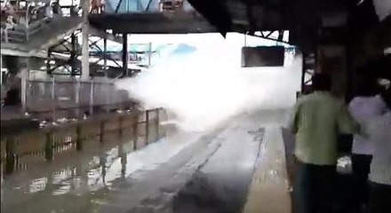 Train Blasts Through Flooded Subway Stop, Smashes A Sheet Of Water Into Everyone