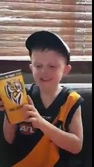Wow wow wow, little fella loves his Tigers @Richmond_FC #AFLTigersGiants