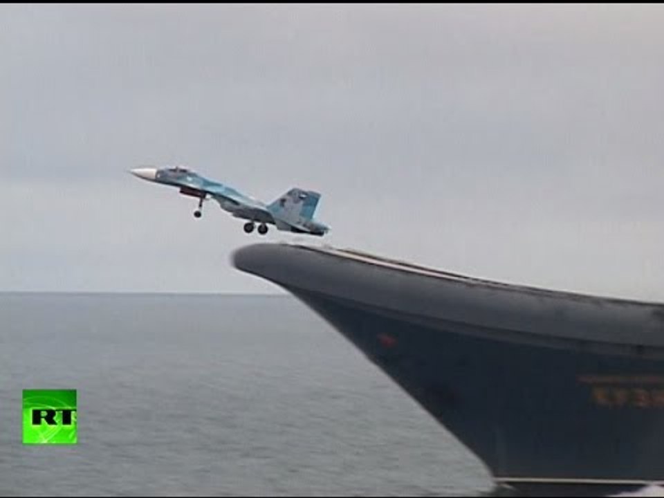 Arctic drills: Russia’s Northern fleet pilots polish deck takeoff & landing skills