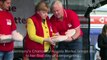 Merkel shows off first aid moves to Stayin' Alive soundtrack