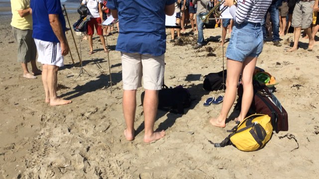 Départ de la traversée de la baie en musique