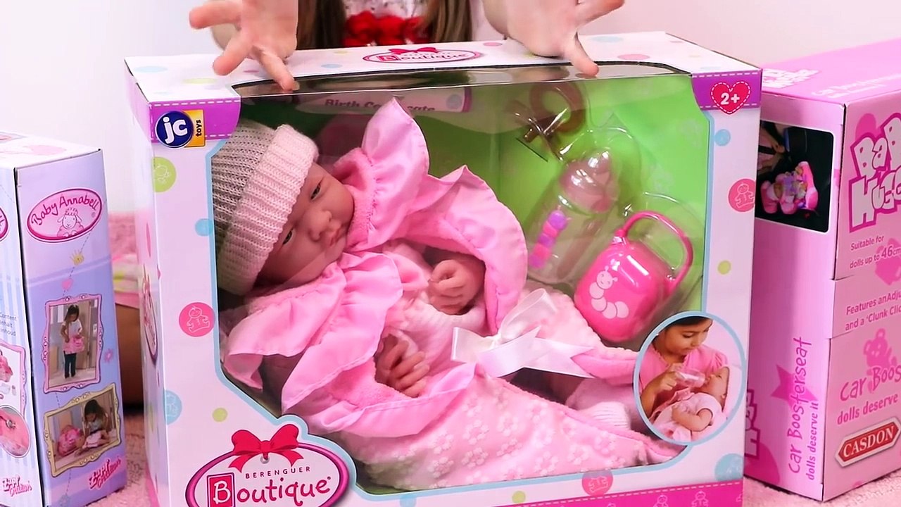 Girl playing with silicon baby doll - change diaper, feed baby and kids car ride on hot wheels