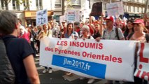 Thousands rally in Paris against Macron’s labour reforms