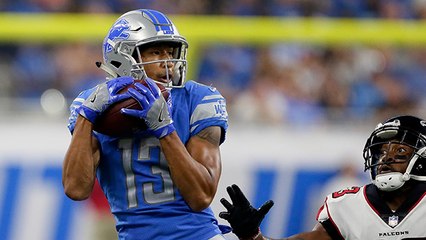 T.J. Jones hauls in the 20-yard pass from Matthew Stafford