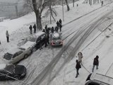 Man Stops Sliding Car From Crashing